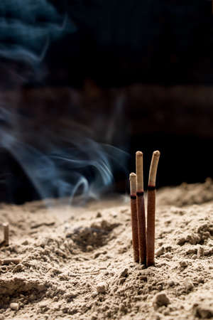 Incense sticks burningの写真素材