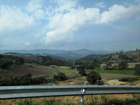Beautiful landscape view from the window of a car in the mountainsの写真素材