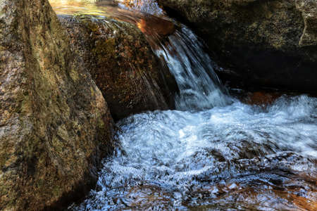 water flowing over rocks