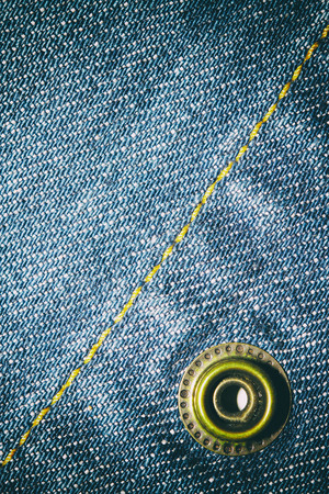 Blue jeans texture background and button and seamの写真素材