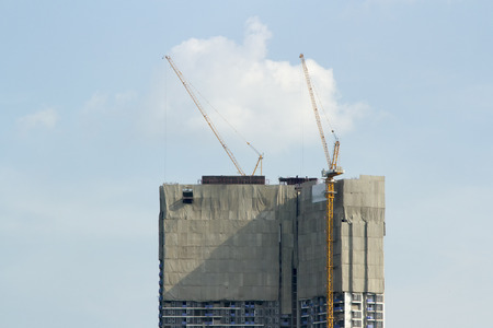 building site with cranes and blue skyの写真素材