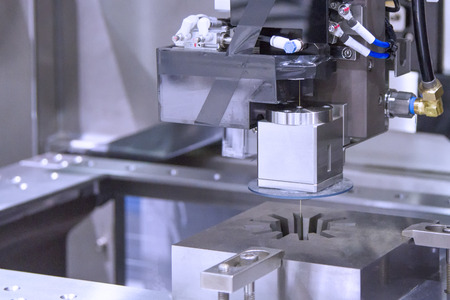 Wire cutting machine cutting metalの写真素材