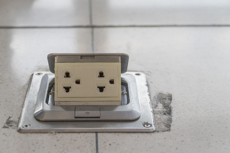 Electrical plugs of white at floor dirty ,16A 250Vの写真素材