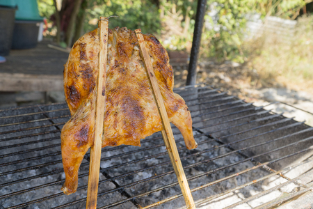 Grilled chicken with grate grill looks delicious の写真素材