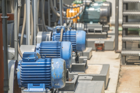 Old blue electric motors and working and lined.の写真素材