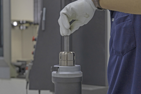 CNC tools of hand man setting toolingの写真素材