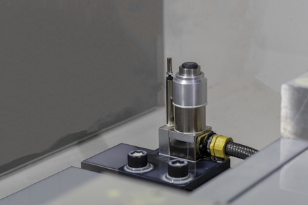 CNC setting tool length on the machineの写真素材