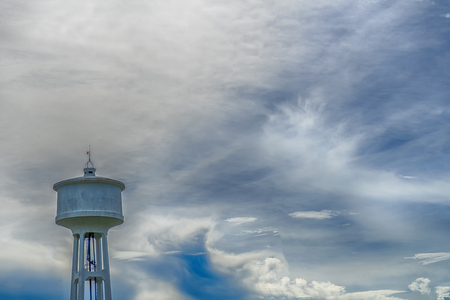 Water tank tower at evening on cloud backgroundの写真素材
