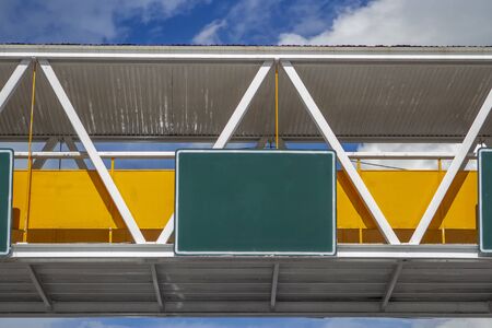 Green background label and blue sky backgroundの写真素材