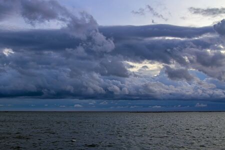 Storm at sea rain or clouds on skyの写真素材