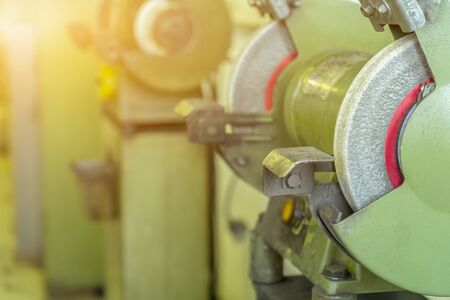 Grinding machine in factory on the mold shopの写真素材