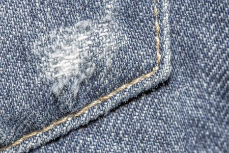 Jeans texture background and seam for text areaの写真素材