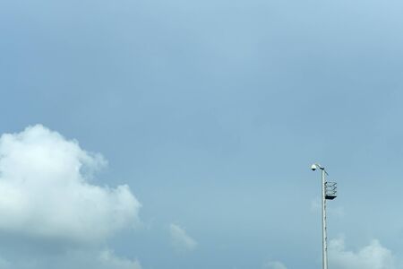 Light Post and cloud with Blue Sky Background 