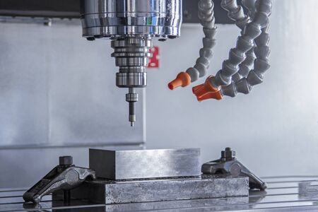 CNC machining center setting center bar after cutting metalの写真素材