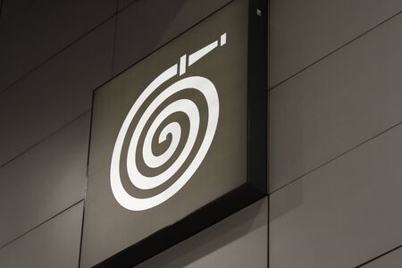 Fire hose symbol of gray black wall mounted abstract backgroundの写真素材