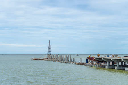 Under construction of a bridge in the seaの写真素材