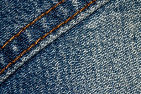Blue jeans texture background and button and seamの写真素材