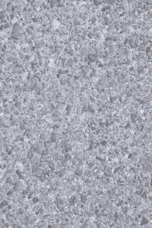 Old white pebble floor, white marble as a background, verticalの写真素材