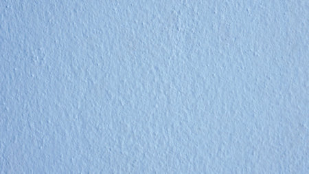 beautiful abstract blue 16:9 stucco wall background, blue concrete wall in a cold mood color concept background with space for text.の写真素材