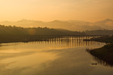 Wooden bridge across the river in the early hours  A beautiful pictureの写真素材