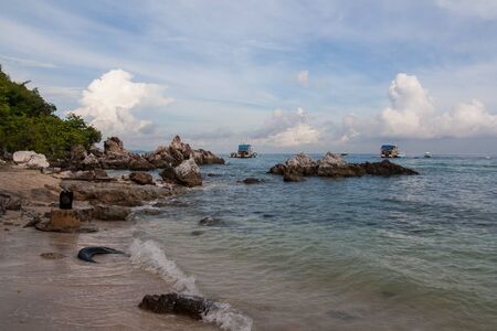 Rocks by the sea in the morningの写真素材