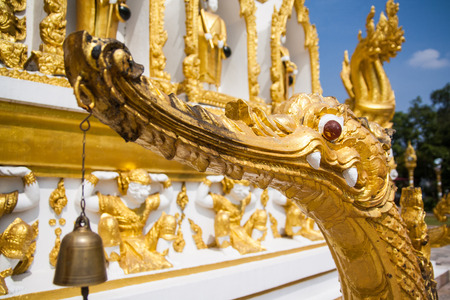 Golden swan sculpture in templeの写真素材