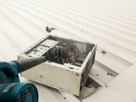 Old computers in the factory for repairの写真素材