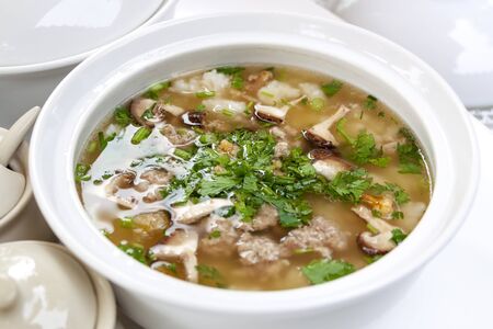 Boiled rice with pork is deliciousの写真素材