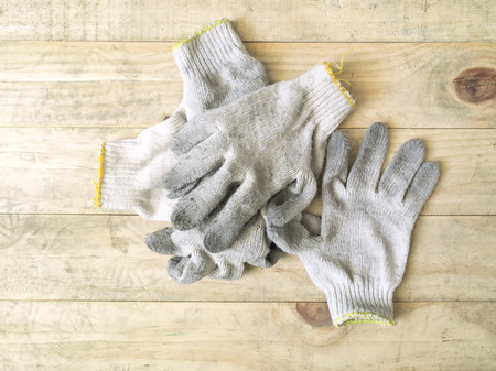 gloves on wooden background