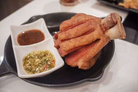 Fried pork leg on dish for dinner
