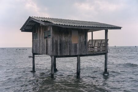 fisherman old huts on the seaの写真素材