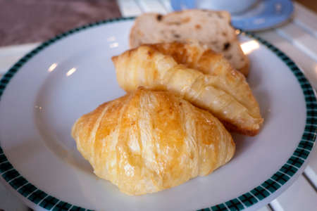 Classic Croissant served with coffeeの写真素材