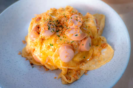 Scrambled Egg Rice and Sausage for Breakfastの写真素材