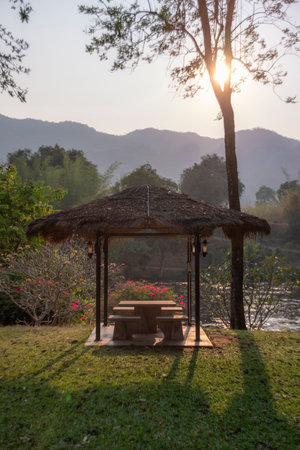 Pavilion to sit and relax by the riverの写真素材