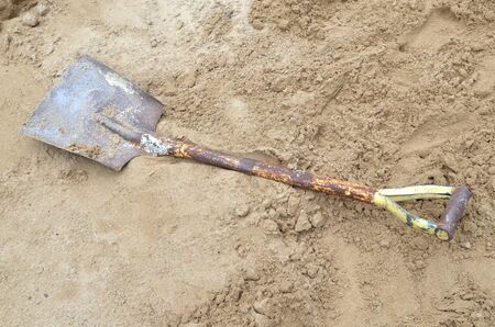 Soil with shovel. Close-upの写真素材