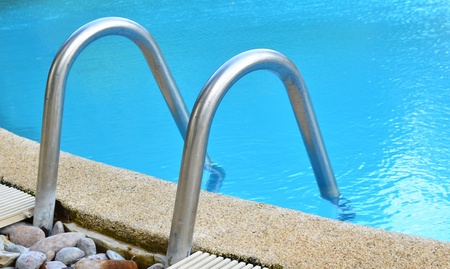 Swimming pool with stair at hotel in Thailand