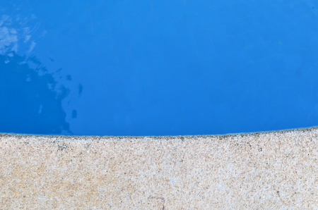 part of swimming pool with blue waterの写真素材