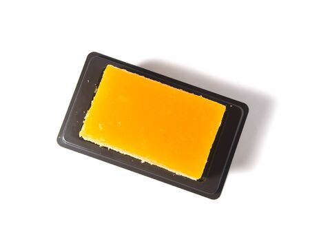 orange cake isolated on white backgroundの写真素材