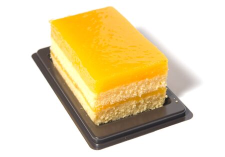 orange cake isolated on white backgroundの写真素材