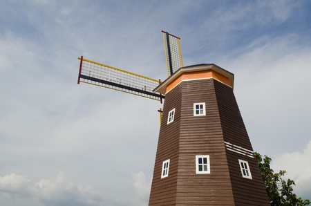 Traditional Dutch windmills with blue skyの写真素材