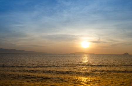 Beautiful red sunset over the oceanの写真素材