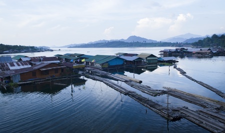 Sunset view and houseboat at Sangklaburi Thailandの写真素材