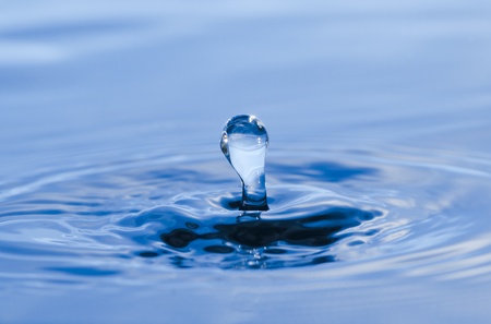 water splash in blue backgroundの写真素材