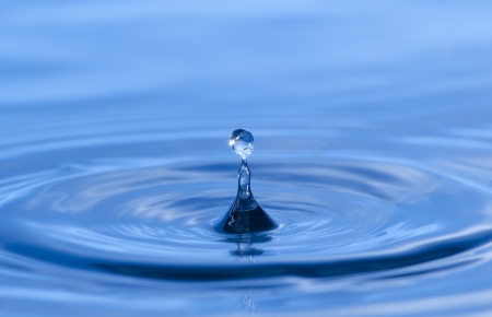 Abstract picture of water splash like crown, Blue backgroundの写真素材