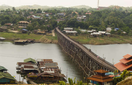The longest wooden bridge and floating Town in Sangklaburi Kanchanaburi Thailandのeditorial素材