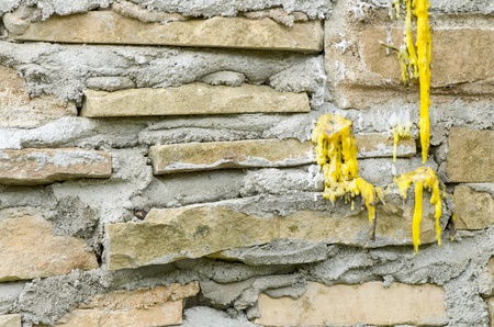 Background of stone wall textureの写真素材