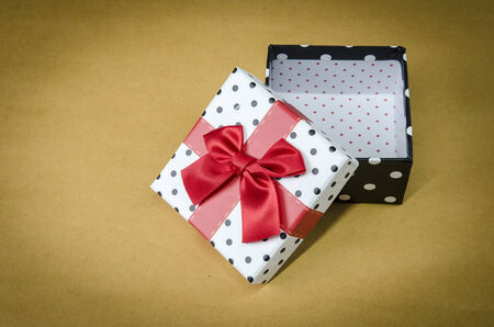 Vintage gift box on brown paper background
