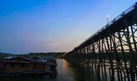 The wooden bridge is the second longest in the world. at Sangklaburi in Kanchanaburi, Thailandの写真素材