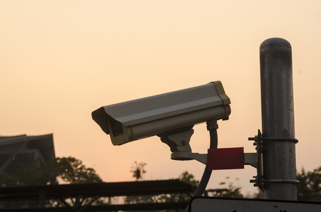 Security Camera CCTV wit sky sunsetの写真素材