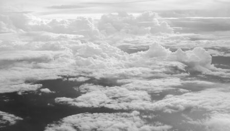 The view from the plane of cloud and blue skyの写真素材
